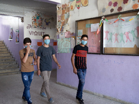 Syrian students in Idlib province take the middle school exam while maintaining safety procedures against the Coronavirus on July 12, 2020 (