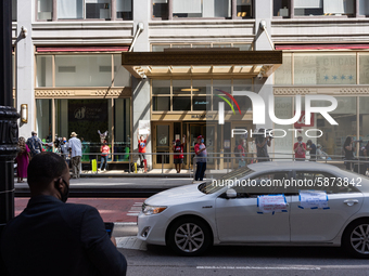 Chicago Teachers Union members and supporters join a car caravan outside Chicago Public Schools (CPS) headquarters while a Chicago Board of...