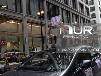 Chicago Teachers Union members and supporters join a car caravan outside Chicago Public Schools (CPS) headquarters while a Chicago Board of...