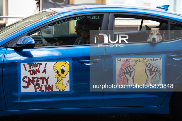 Chicago Teachers Union members and supporters join a car caravan outside Chicago Public Schools (CPS) headquarters while a Chicago Board of...