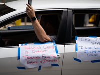 Chicago Teachers Union members and supporters join a car caravan outside Chicago Public Schools (CPS) headquarters while a Chicago Board of...