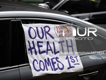 Chicago Teachers Union members and supporters join a car caravan outside Chicago Public Schools (CPS) headquarters while a Chicago Board of...