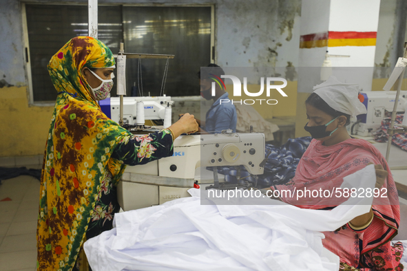 Ready made garments workers works in a garments factory in Dhaka on July 25, 2020. 