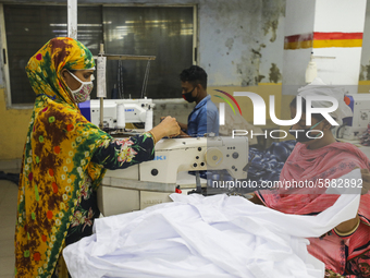 Ready made garments workers works in a garments factory in Dhaka on July 25, 2020. (