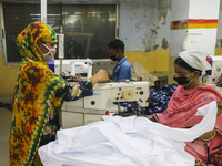 Ready made garments workers works in a garments factory in Dhaka on July 25, 2020. (