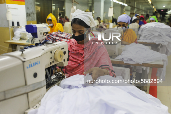 Ready made garments workers works in a garments factory in Dhaka on July 25, 2020. 