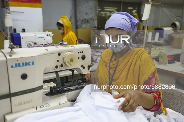 Ready made garments workers works in a garments factory in Dhaka on July 25, 2020. 