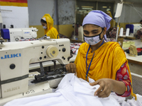 Ready made garments workers works in a garments factory in Dhaka on July 25, 2020. (