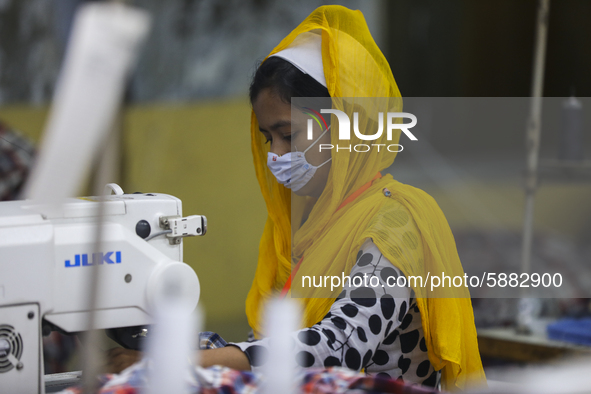 Ready made garments worker works in a garments factory in Dhaka on July 25, 2020. 