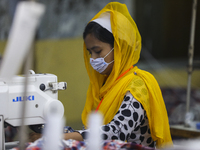 Ready made garments worker works in a garments factory in Dhaka on July 25, 2020. (