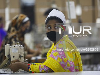 Ready made garments workers works in a garments factory in Dhaka on July 25, 2020. (