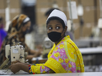 Ready made garments workers works in a garments factory in Dhaka on July 25, 2020. (