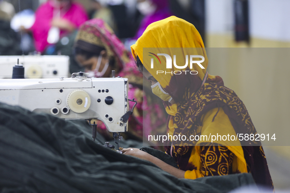 Ready made garments workers works in a garments factory in Dhaka on July 25, 2020. 