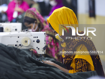 Ready made garments workers works in a garments factory in Dhaka on July 25, 2020. (