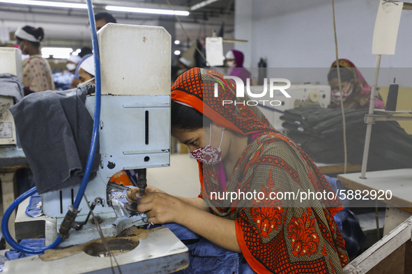 Ready made garments workers works in a garments factory in Dhaka on July 25, 2020. 