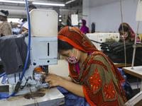 Ready made garments workers works in a garments factory in Dhaka on July 25, 2020. (