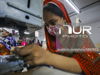 Ready made garments workers works in a garments factory in Dhaka on July 25, 2020. (