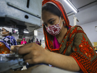 Ready made garments workers works in a garments factory in Dhaka on July 25, 2020. (