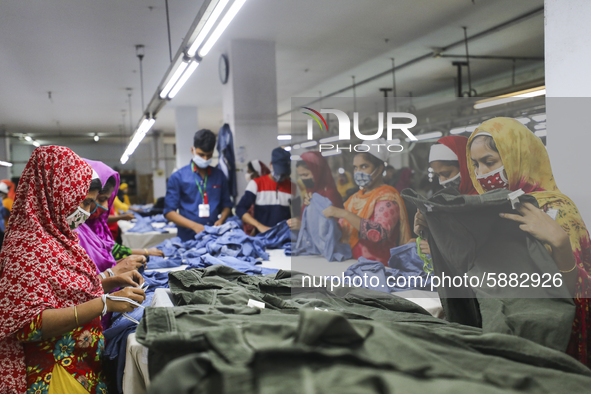 Ready made garments workers works in a garments factory in Dhaka on July 25, 2020. 