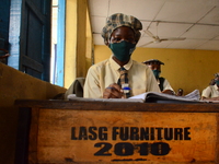 High School female students wears a face mask while they reads in a classroom at Girls Junior Grammar School, S.W, Ikoyi, Lagos on August 3,...