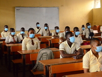 High School female students wears a face mask while they reads in a classroom at Ireti Junior Grammar Schol, Ikoyi, Lagos on August 3, 2020...