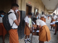 Final year students of Agidingbi Senior Grammar School, Ikeja, Lagos, Nigeria register as they resume school after COVID-19 lockdown order o...