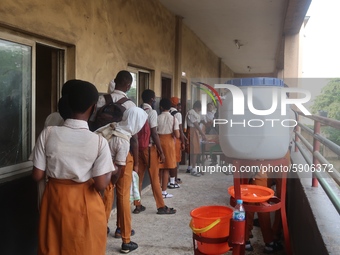 Final year students of Agidingbi Senior Grammar School, Ikeja, Lagos, Nigeria register as they resume school after COVID-19 lockdown order o...