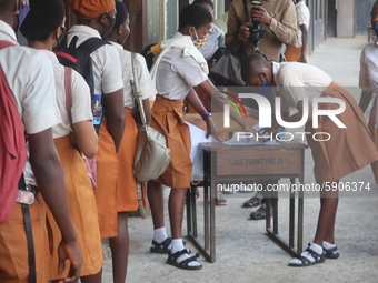 Final year students of Agidingbi Senior Grammar School, Ikeja, Lagos, Nigeria register as they resume school after COVID-19 lockdown order o...