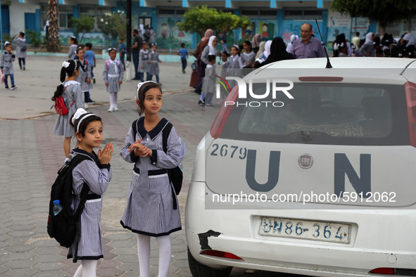 Palestinian students at a United-Nations run school as a new school year begins as Palestinians ease the coronavirus disease (COVID-19) rest...