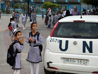 Palestinian students at a United-Nations run school as a new school year begins as Palestinians ease the coronavirus disease (COVID-19) rest...