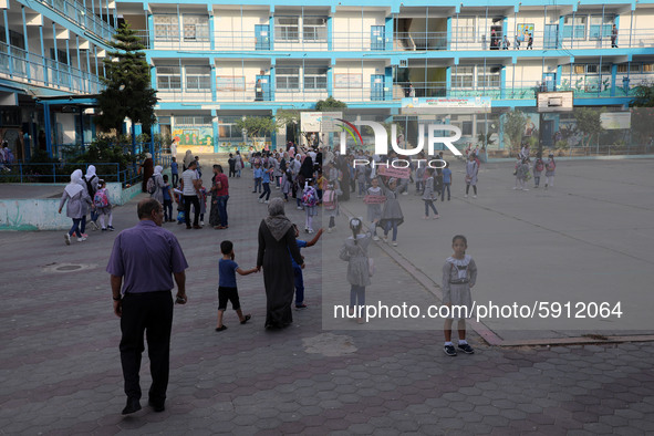 Palestinian students at a United-Nations run school as a new school year begins as Palestinians ease the coronavirus disease (COVID-19) rest...