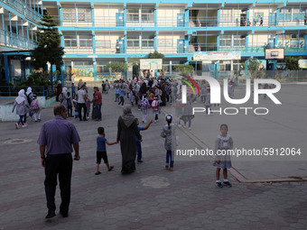 Palestinian students at a United-Nations run school as a new school year begins as Palestinians ease the coronavirus disease (COVID-19) rest...