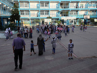 Palestinian students at a United-Nations run school as a new school year begins as Palestinians ease the coronavirus disease (COVID-19) rest...