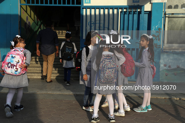 Palestinian students at a United-Nations run school as a new school year begins as Palestinians ease the coronavirus disease (COVID-19) rest...