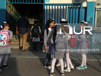 Palestinian students at a United-Nations run school as a new school year begins as Palestinians ease the coronavirus disease (COVID-19) rest...