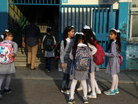 Palestinian students at a United-Nations run school as a new school year begins as Palestinians ease the coronavirus disease (COVID-19) rest...