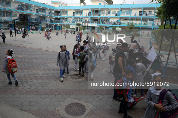 Palestinian students at a United-Nations run school as a new school year begins as Palestinians ease the coronavirus disease (COVID-19) rest...