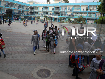 Palestinian students at a United-Nations run school as a new school year begins as Palestinians ease the coronavirus disease (COVID-19) rest...