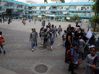 Palestinian students at a United-Nations run school as a new school year begins as Palestinians ease the coronavirus disease (COVID-19) rest...