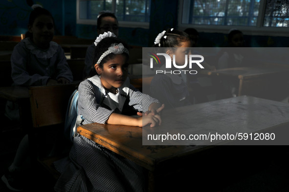 Palestinian students sit in a classroom at a United-Nations run school as a new school year begins as Palestinians ease the coronavirus dise...