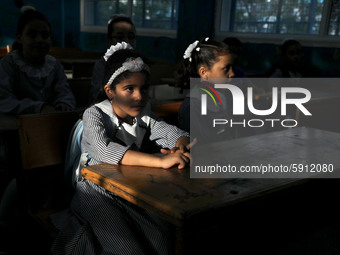 Palestinian students sit in a classroom at a United-Nations run school as a new school year begins as Palestinians ease the coronavirus dise...