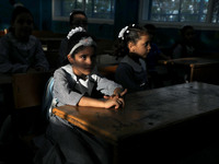 Palestinian students sit in a classroom at a United-Nations run school as a new school year begins as Palestinians ease the coronavirus dise...