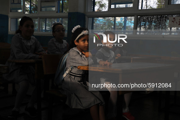 Palestinian students sit in a classroom at a United-Nations run school as a new school year begins as Palestinians ease the coronavirus dise...