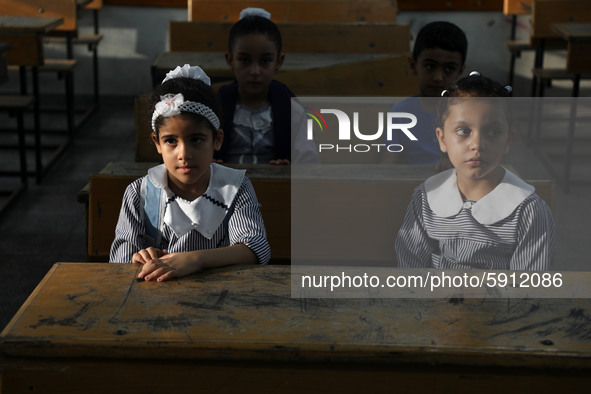 Palestinian students sit in a classroom at a United-Nations run school as a new school year begins as Palestinians ease the coronavirus dise...