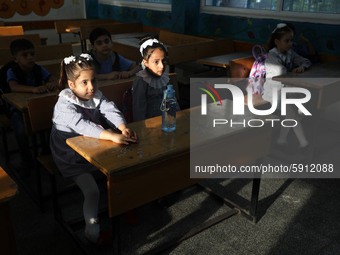 Palestinian students sit in a classroom at a United-Nations run school as a new school year begins as Palestinians ease the coronavirus dise...