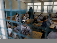 Palestinian students sit in a classroom at a United-Nations run school as a new school year begins as Palestinians ease the coronavirus dise...