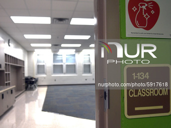 An empty classroom near the building exit which is designated as an isolation room for sick students is seen during a media preview at Layer...