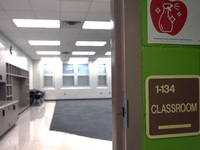 An empty classroom near the building exit which is designated as an isolation room for sick students is seen during a media preview at Layer...