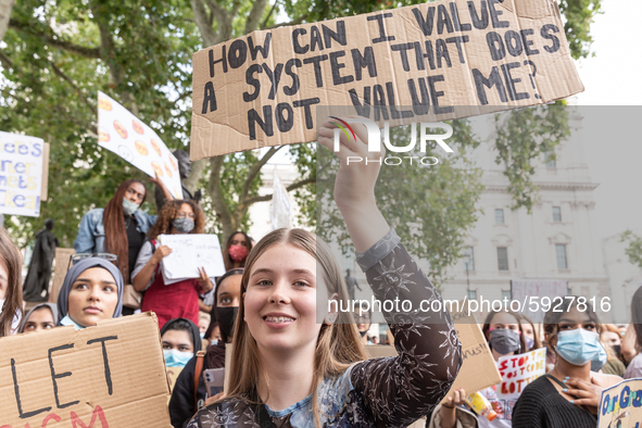 Youth protests at Parliament square against a new exam rating system which has been introduced in British education system - London, England...