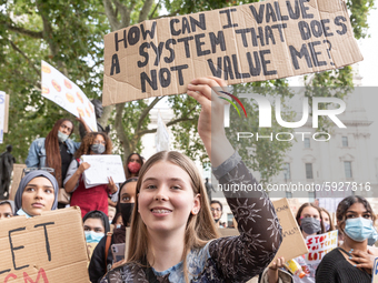 Youth protests at Parliament square against a new exam rating system which has been introduced in British education system - London, England...